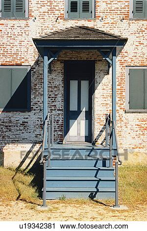 Stock Image - lighthouse located at East Point, New Jersey, United States. Fotosearch