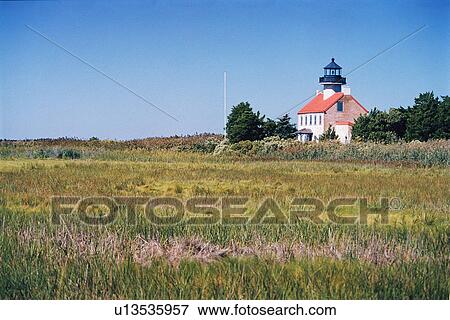 Stock Photo - lighthouse located at East Point, New Jersey, United States. Fotosearch