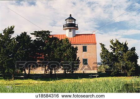 Stock Photograph - lighthouse located at East Point, New Jersey, United States. Fotosearch