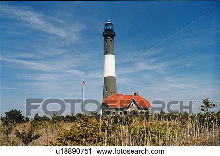 Stock Image - lighthouse located at Fire Island, New York, United States. Fotosearch