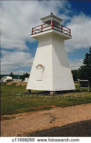 Stock Photo - lighthouse located at Five Islands, Nova Scotia. Fotosearch