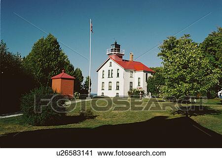 Stock Image - lighthouse located at GrandTraverse, Michigan, United States. Fotosearch