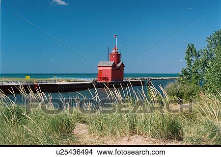 Picture - lighthouse located at Holland Harbor, Michigan, United States. Fotosearch