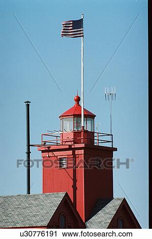 Stock Image - lighthouse located at Holland Harbor, Michigan, United States. Fotosearch