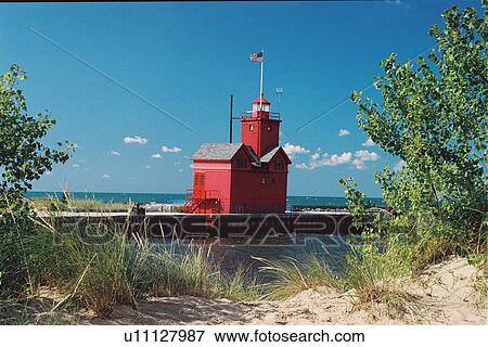 Stock Photo - lighthouse located at Holland Harbor, Michigan, United States. Fotosearch
