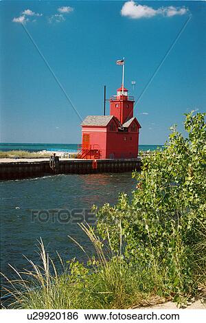 Stock Photograph - lighthouse located at Holland Harbor, Michigan, United States. Fotosearch