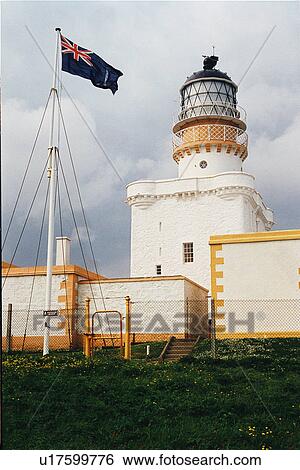 Stock Photograph - lighthouse located at KinnairdHead, Scotland. Fotosearch