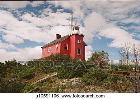 Stock Photograph - lighthouse located at Marquette Harbor, Michigan, United States. Fotosearch