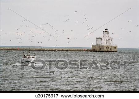 Stock Photo - lighthouse located at MilwaukeeBrkwtr, Washington, United States. Fotosearch