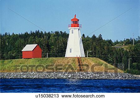 Stock Image - lighthouse located at Mulholland_, New Brunswick. Fotosearch