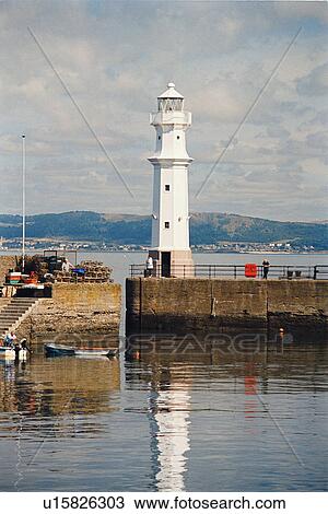 Stock Image - lighthouse located at NewHavenHarbour, Scotland. Fotosearch