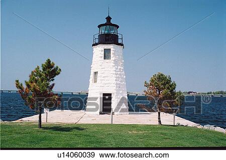 Stock Photo - lighthouse located at Newport Harbor, Rhode Island, United States. Fotosearch