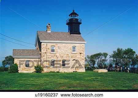 Stock Photo - lighthouse located at OldField Point, New York, United States. Fotosearch