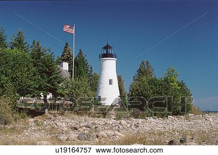 Stock Photo - lighthouse located at OldPresqueIsle, Michigan, United States. Fotosearch