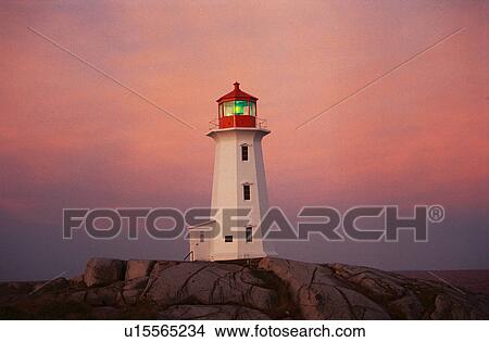 Picture - lighthouse located at Peggys Point, Nova Scotia. Fotosearch