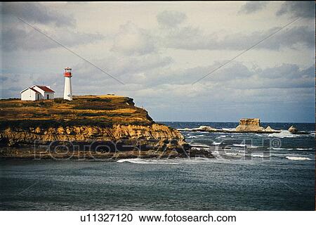 Stock Image - lighthouse located at Point Aconi, Nova Scotia. Fotosearch