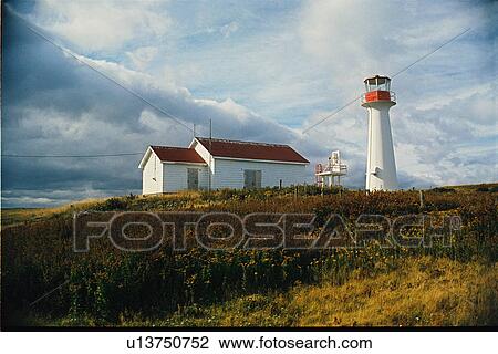 Stock Image - lighthouse located at Point Aconi, Nova Scotia. Fotosearch