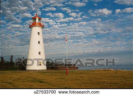 Stock Image - lighthouse located at Point Primm, PEI. Fotosearch