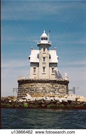 Stock Image - lighthouse located at RaceRock, New York, United States. Fotosearch