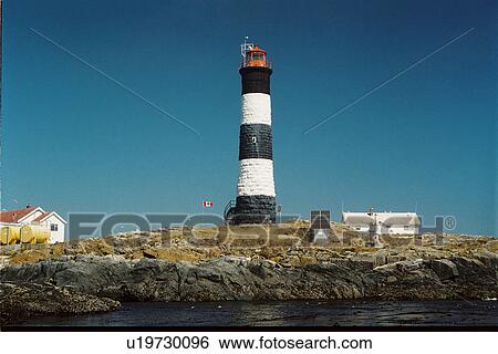 lighthouse located at RaceRocks, British Columbia, Canada View Large Photo Image Stock Photograph - lighthouse located at RaceRocks, British Columbia, Canada. Fotosearch