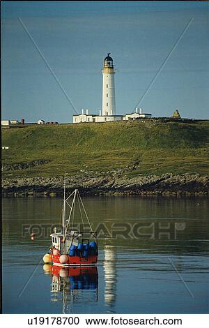Stock Image - lighthouse located at RinnsOfIslay, Scotland. Fotosearch