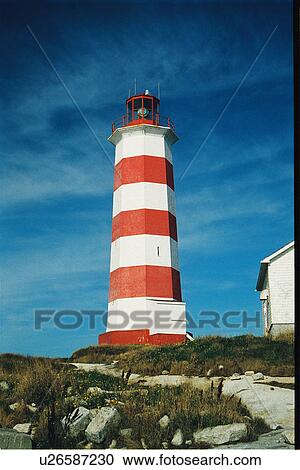 Stock Image - lighthouse located at Sambro Island, Nova Scotia. Fotosearch