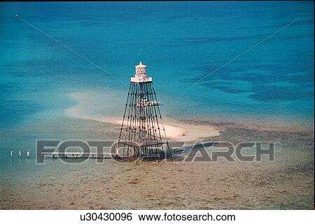 Stock Photograph - lighthouse located at SandKey, Florida, United States. Fotosearch