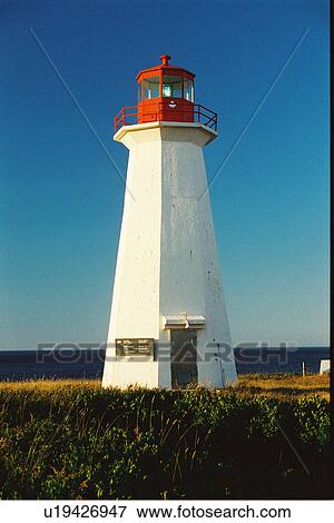 Stock Photo - lighthouse located at Shipwreck Point, PEI. Fotosearch