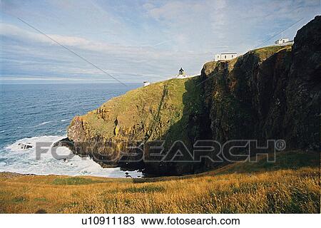 Stock Image - lighthouse located at St. AbbsHead, Scotland. Fotosearch