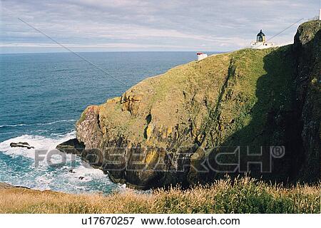 Stock Photo - lighthouse located at St. AbbsHead, Scotland. Fotosearch