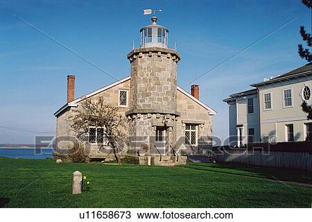 Stock Image - lighthouse located at St. onington Harbor, Conneticut, United States. Fotosearch