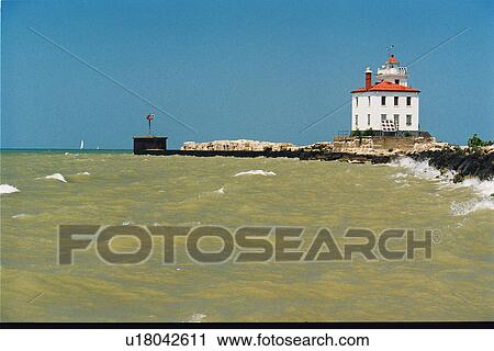 Stock Image - lighthouse located at FairportHrbrWBrkwtr, Ohio, United States. Fotosearch