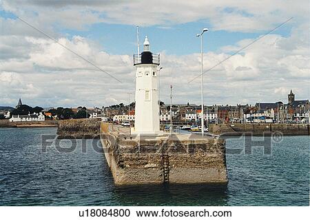 Stock Image - lighthouse located at AnstrutherHarbour, Scotland. Fotosearch