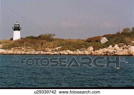 Stock Image - lighthouse located at TenPound Island, Massachusetts, United States. Fotosearch