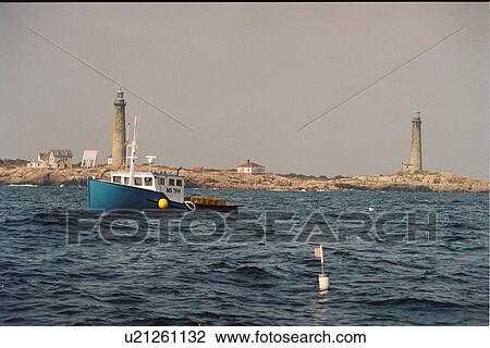 Stock Image - lighthouse located at Thachers Island, Massachusetts, United States. Fotosearch