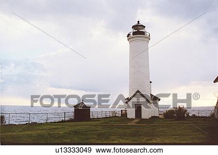 Stock Photo - lighthouse located at Tibbetts Point, New York, United States. Fotosearch