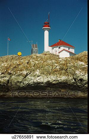 Stock Image - lighthouse located at Trail Islands, British Columbia, Canada. Fotosearch