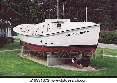 Stock Image - lighthouse located at Umpqua River, Oregon, United States. Fotosearch
