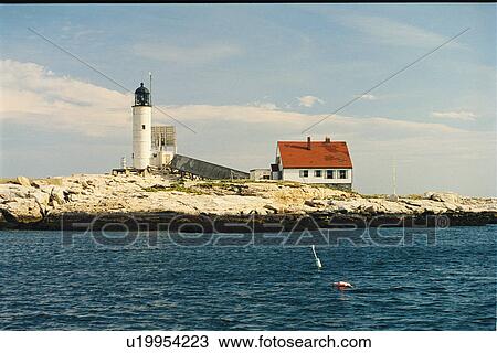 Stock Image - lighthouse located at White Island, New Hampshire, United States. Fotosearch