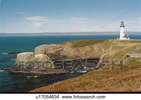 Picture - lighthouse located at YaquinaHead, Oregon, United States. Fotosearch