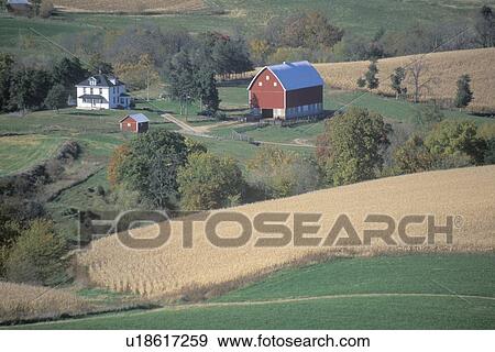 Stock Photo - A farm with rolling fields. Fotosearch