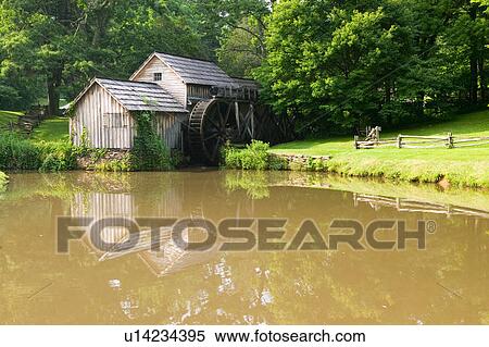 Grist Mill on pond in summer View Large Photo Image Stock Photography - Grist Mill on pond in summer. Fotosearch