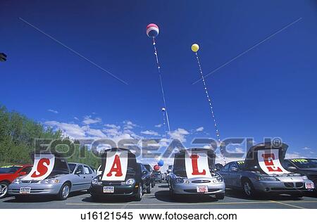 Stock Photography - A sign that reads “Sale”. Fotosearch