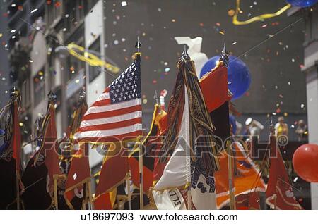 Flags Held Aloft in Ticker Tape Parade View Large Photo Image Stock Image - Flags Held Aloft in Ticker Tape Parade. Fotosearch