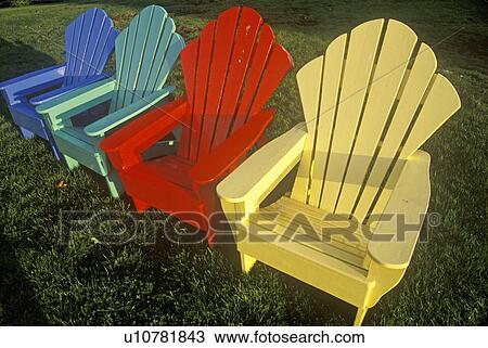 Group of four multi colored chairs on lawn View Large Photo Image Stock Image - Group of four multi colored chairs on lawn . Fotosearch