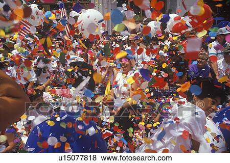 People Celebrating in Rain of Confetti View Large Photo Image Stock Photo - People Celebrating in Rain of Confetti. Fotosearch