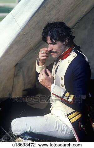 Stock Image - Close up of Revolutionary war reenactment soldier in camp. Fotosearch