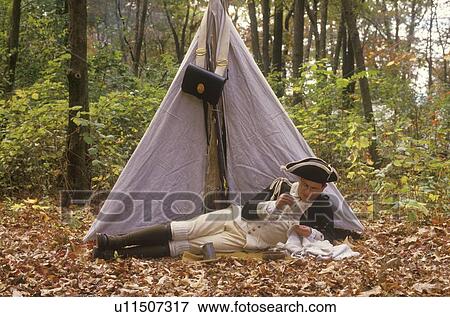 Stock Photo - Participant in front of tent during Historical American Revolutionary war event, New Windsor, NY. Fotosearch