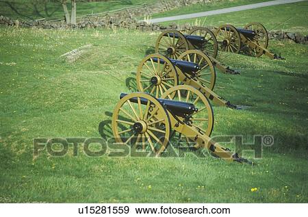 Stock Photo - Row of cannons at Gettysburg, PA National Park. Fotosearch