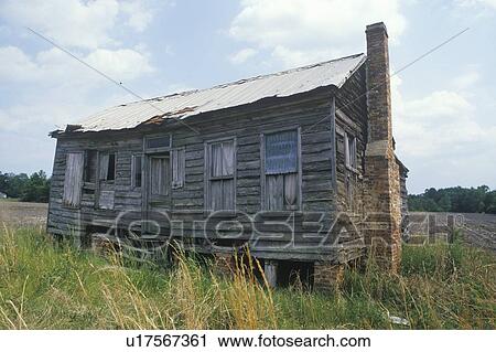 Stock Image - Slave quarters on a plantation in the South. Fotosearch